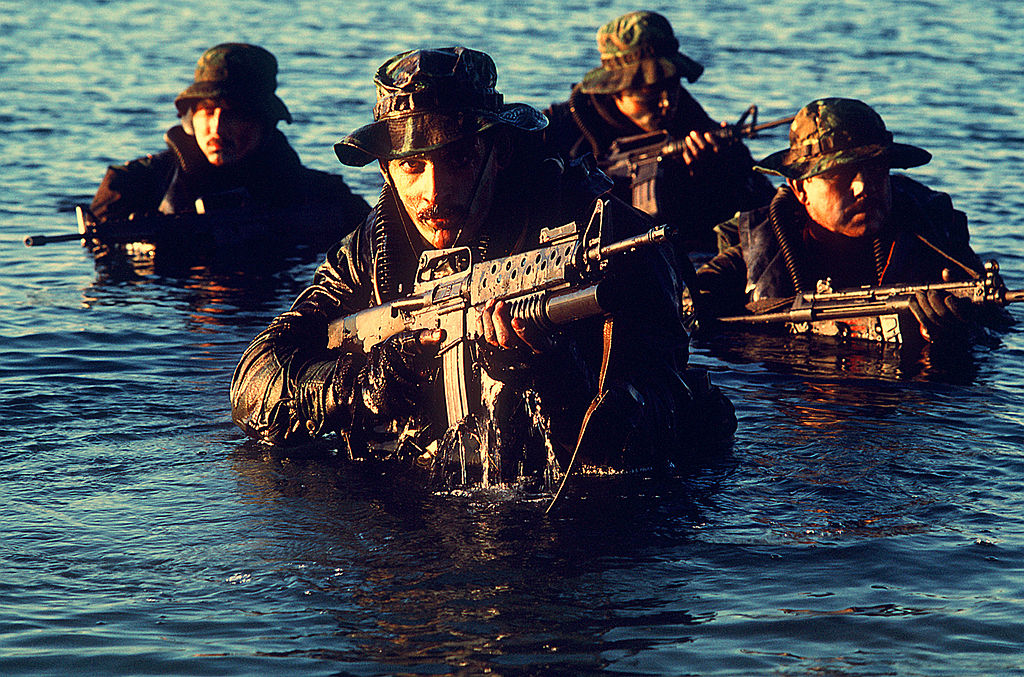 Navy_SEALs_coming_out_of_water.JPEG